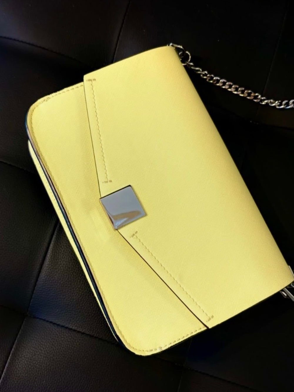 Yellow handbag with silver chain
